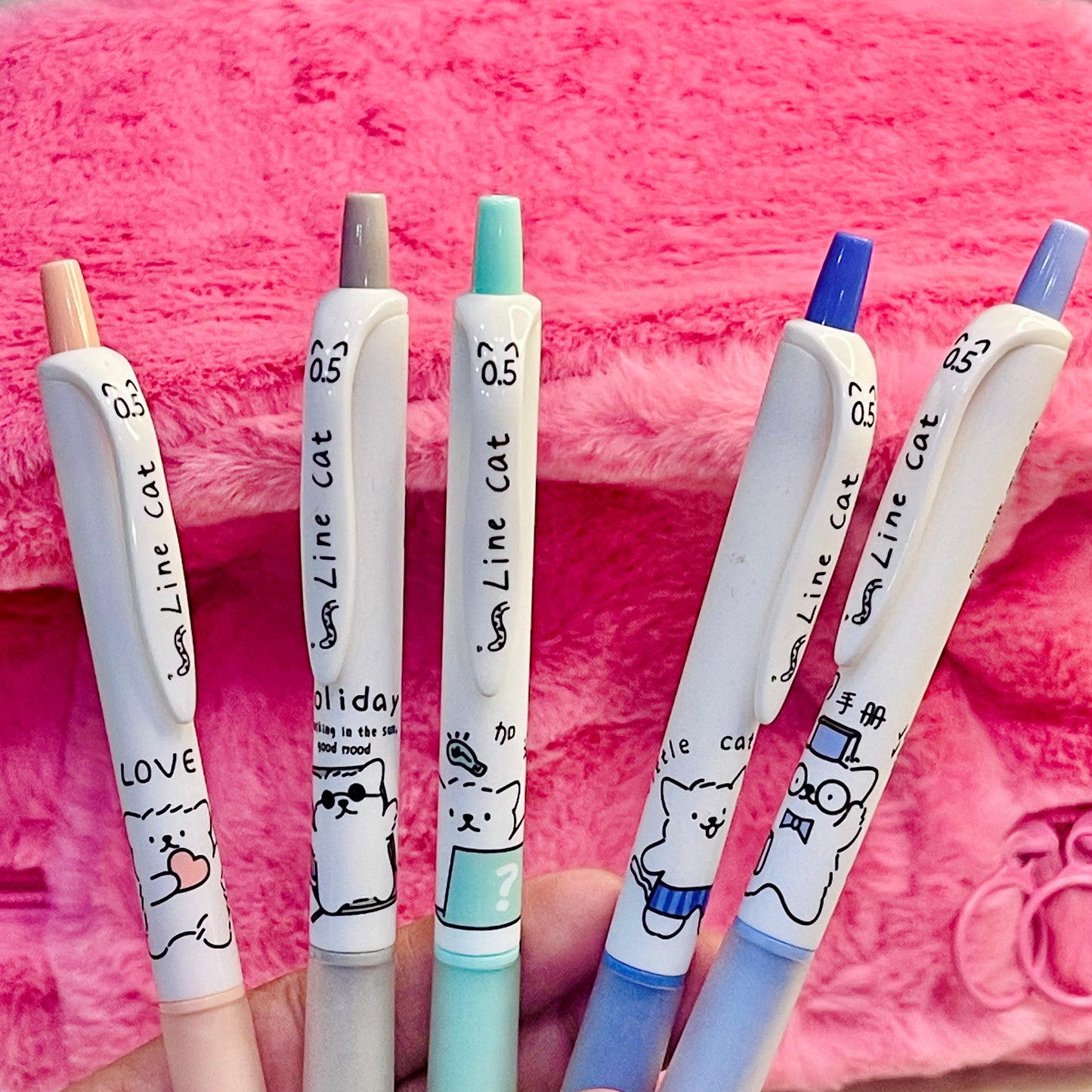 Little white cat pens